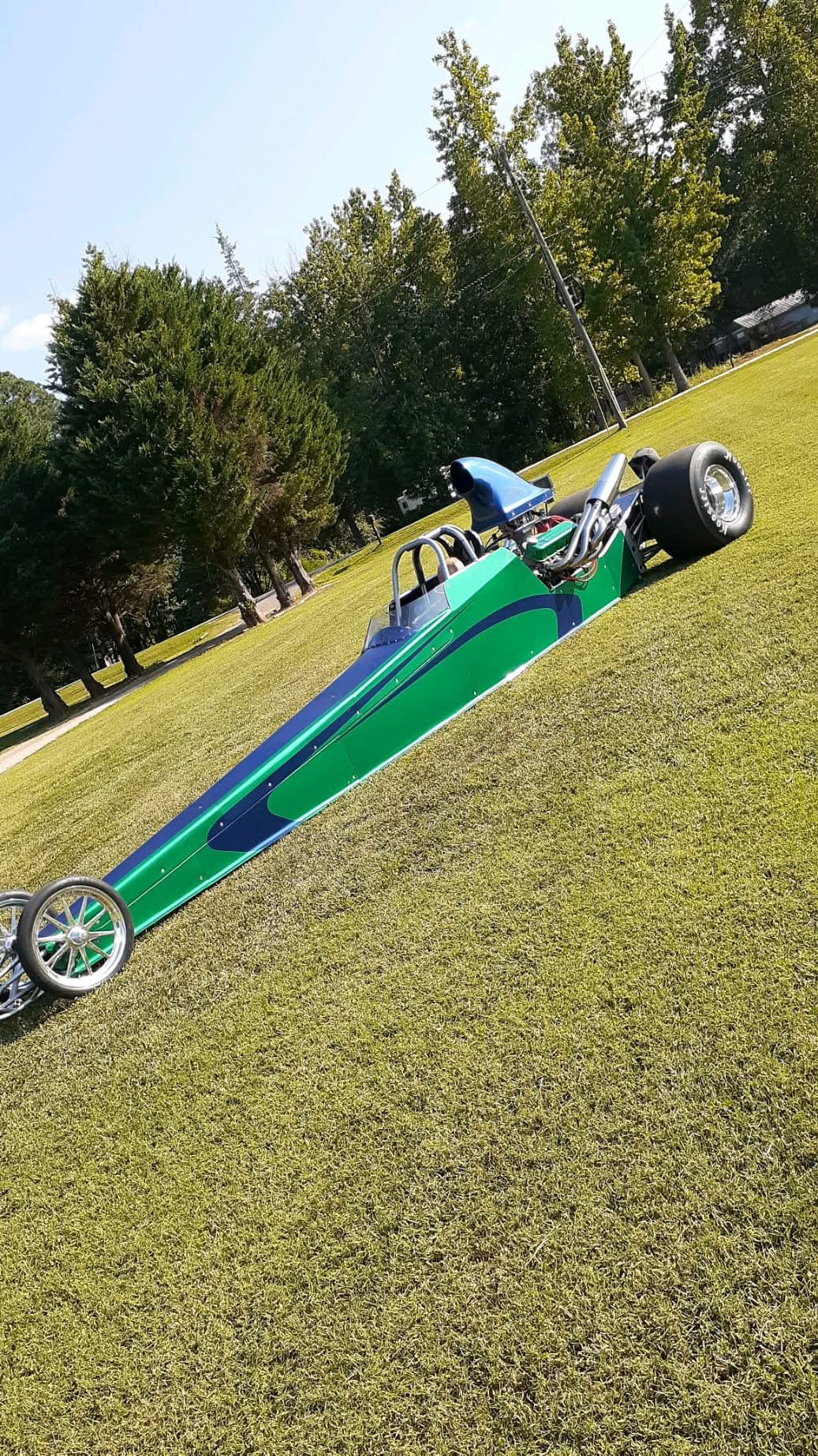 Green and blue dragster on display